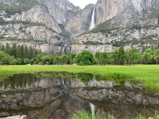 Upper and Lower Falls of Yosemite reflected in water