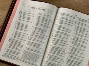 white book page on brown wooden table